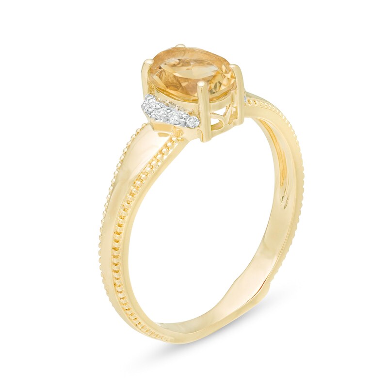 Oval Citrine and 1/20 CT. T.W. Diamond Collar Frame Vintage-Style Ring in 10K Gold