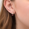 Thumbnail Image 2 of Oval Garnet and 1/20 CT. T.W. Diamond Beaded Drop Earrings in 10K Gold