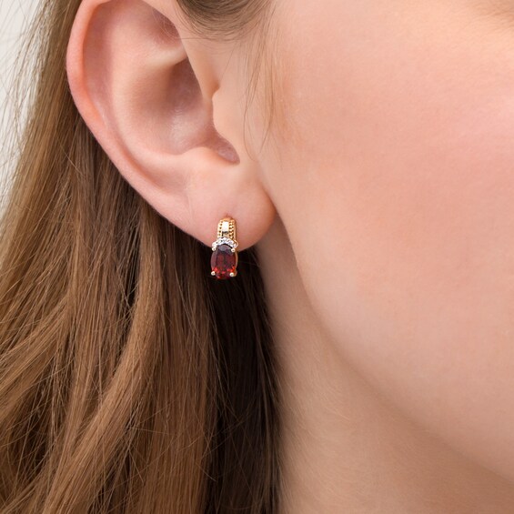 Oval Garnet and 1/20 CT. T.w. Diamond Beaded Drop Earrings in 10K Gold