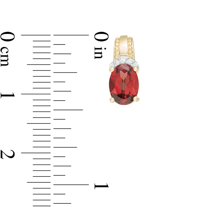 Main Image 3 of Oval Garnet and 1/20 CT. T.W. Diamond Beaded Drop Earrings in 10K Gold