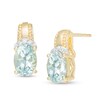 Thumbnail Image 1 of Oval Aquamarine and 1/20 CT. T.W. Diamond Beaded Drop Earrings in 10K Gold