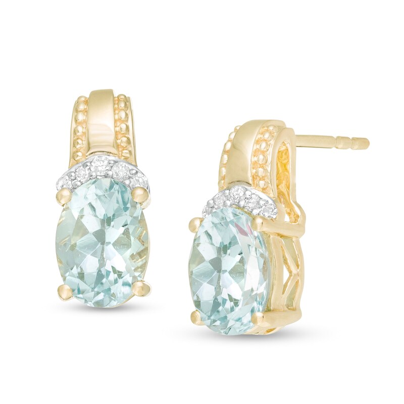 Main Image 1 of Oval Aquamarine and 1/20 CT. T.W. Diamond Beaded Drop Earrings in 10K Gold