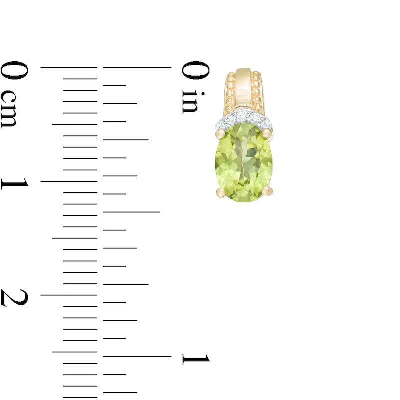 Main Image 3 of Oval Peridot and 1/20 CT. T.W. Diamond Beaded Drop Earrings in 10K Gold