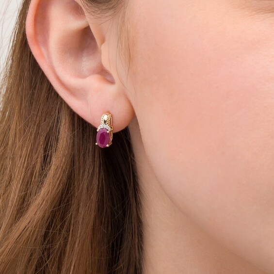 Oval Ruby and 1/20 CT. T.w. Diamond Beaded Drop Earrings in 10K Gold