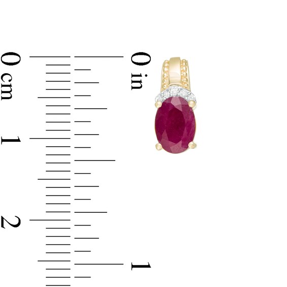 Oval Ruby and 1/20 CT. T.w. Diamond Beaded Drop Earrings in 10K Gold