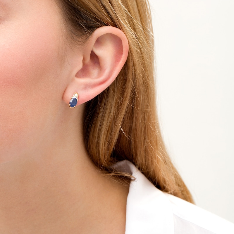 Main Image 2 of Oval Blue Sapphire and 1/20 CT. T.W. Diamond Beaded Drop Earrings in 10K Gold