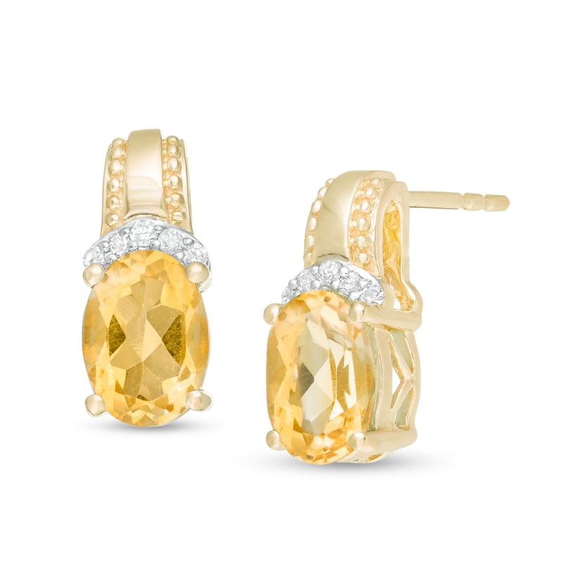 Main Image 1 of Oval Citrine and 1/20 CT. T.W. Diamond Beaded Drop Earrings in 10K Gold