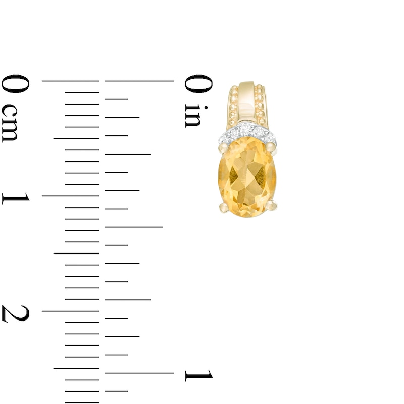 Main Image 3 of Oval Citrine and 1/20 CT. T.W. Diamond Beaded Drop Earrings in 10K Gold