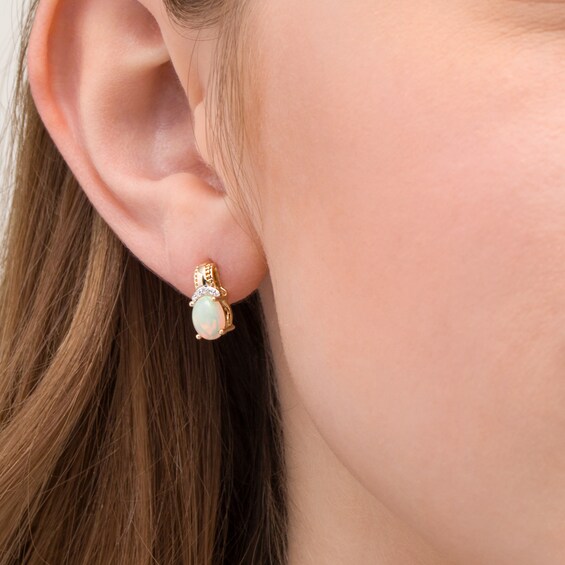 Oval Opal and 1/20 CT. T.w. Diamond Beaded Drop Earrings in 10K Gold