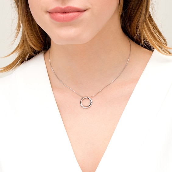 "A sister is a friend forever" Engraved Circle Outline Pendant in Sterling Silver - 16"