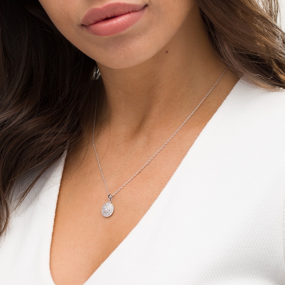 1/2 CT. T.w. Baguette and Round Diamond Triple Frame Circle Pendant in 10K White Gold