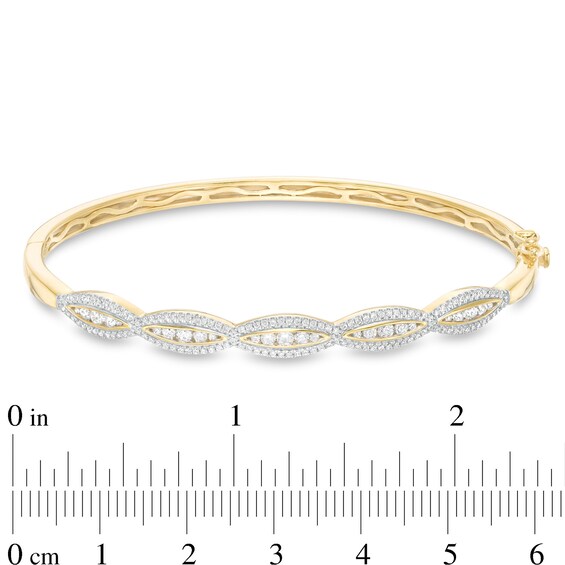 1 CT. T.W. Diamond Scallop Edge Bangle in 10K Gold 1 CT. T.W. Diamond Scallop Edge Bangle in 10K Gold