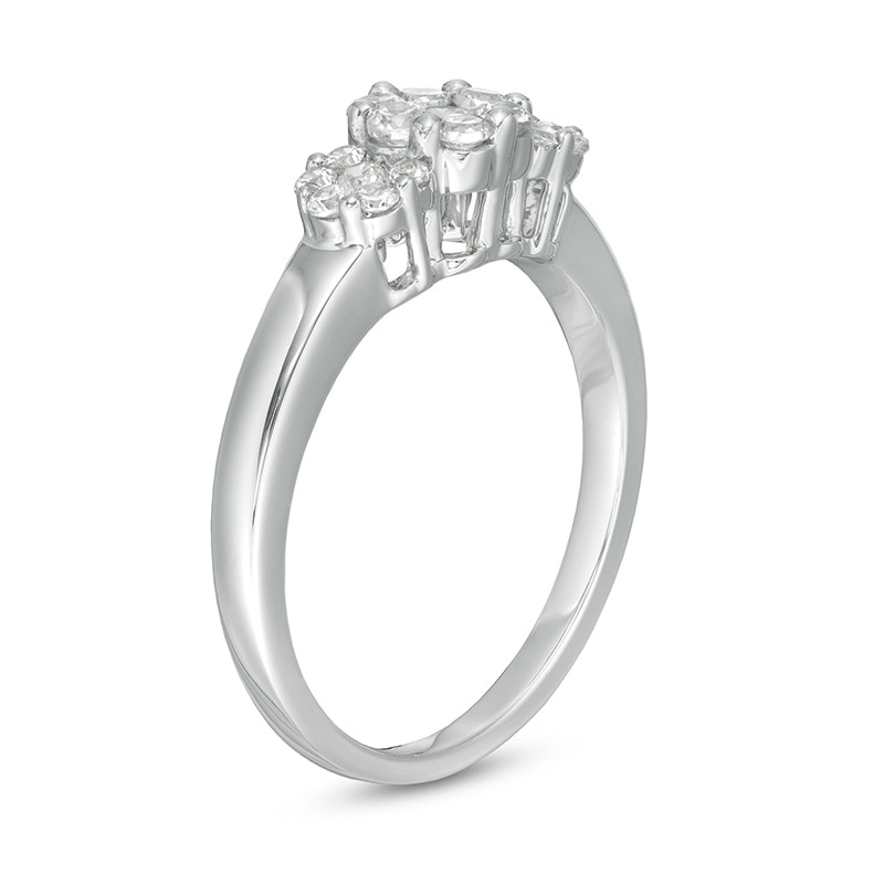 1/2 CT. T.W. Multi-Diamond Triple Flower Ring in 10K White Gold
