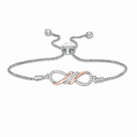 1/15 CT. T.w. Diamond Infinity Sideways Bolo Bracelet in Sterling Silver and 10K Rose Gold - 9.5"