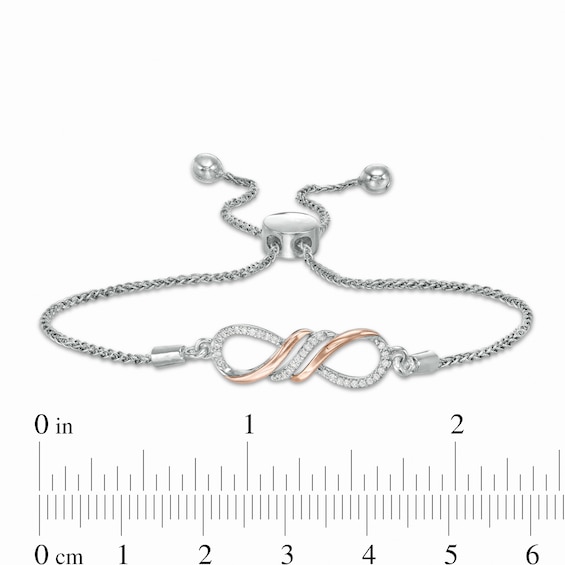 1/15 CT. T.w. Diamond Infinity Sideways Bolo Bracelet in Sterling Silver and 10K Rose Gold - 9.5"