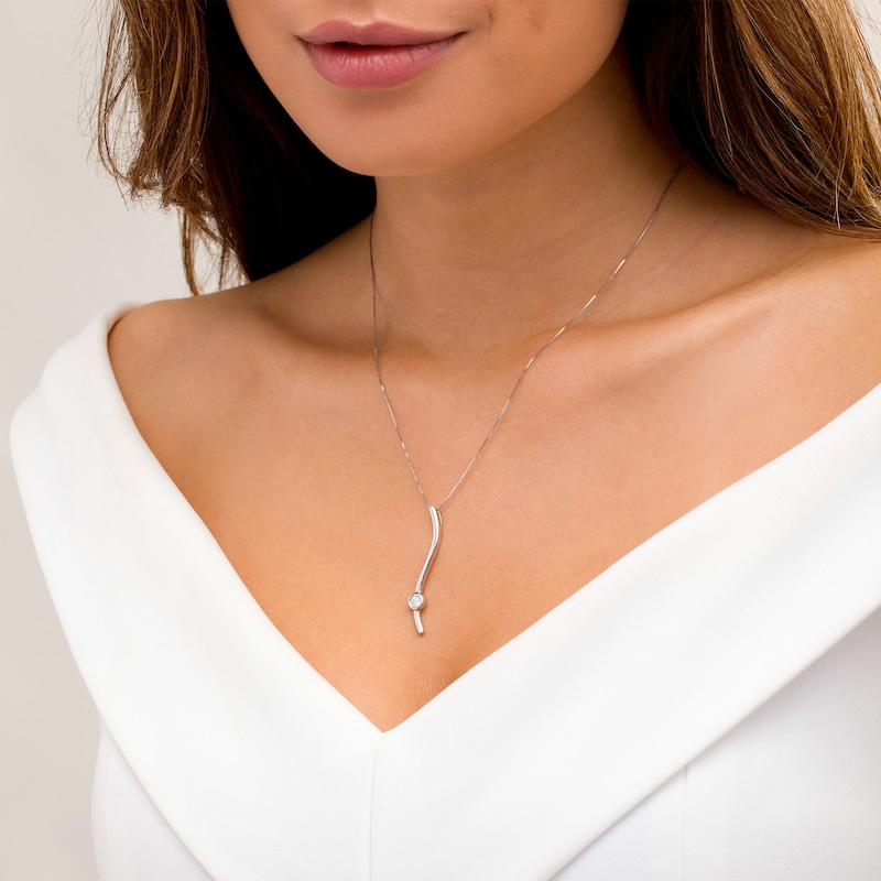 Marilyn Monroe™ Collection 1/6 CT. Diamond Solitaire Linear Ribbon Pendant in Sterling Silver