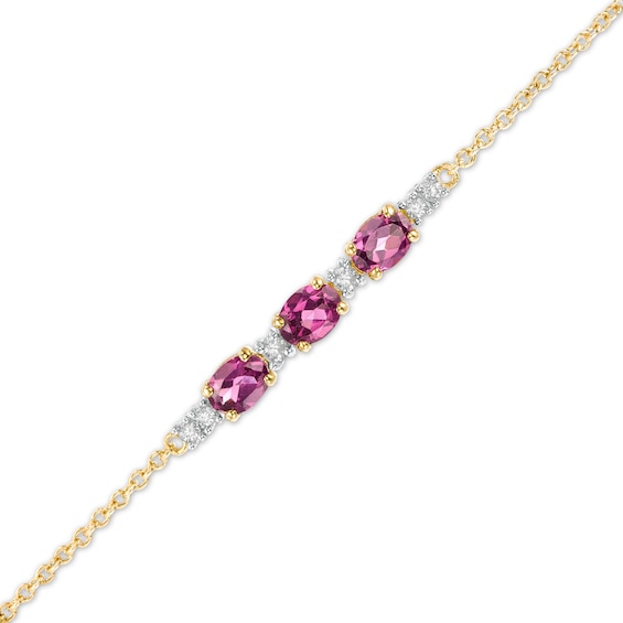 Oval Rhodolite Garnet and 1/20 CT. T.w. Diamond Bracelet in 10K Gold - 7.5"