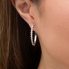 Thumbnail Image 1 of 1/2 CT. T.W. Diamond Oval Hoop Earrings in 10K White Gold