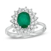 Oval Emerald and 1/2 CT. T.W. Diamond Starburst Frame Ring in 10K White Gold