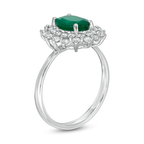 Oval Emerald and 1/2 CT. T.w. Diamond Starburst Frame Ring in 10K White Gold
