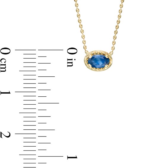 Sideways Oval Blue Sapphire Beaded Pendant in 10K Gold