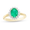 Thumbnail Image 1 of Oval Emerald and 1/5 CT. T.W. Diamond Starburst Frame Ring in 10K Gold