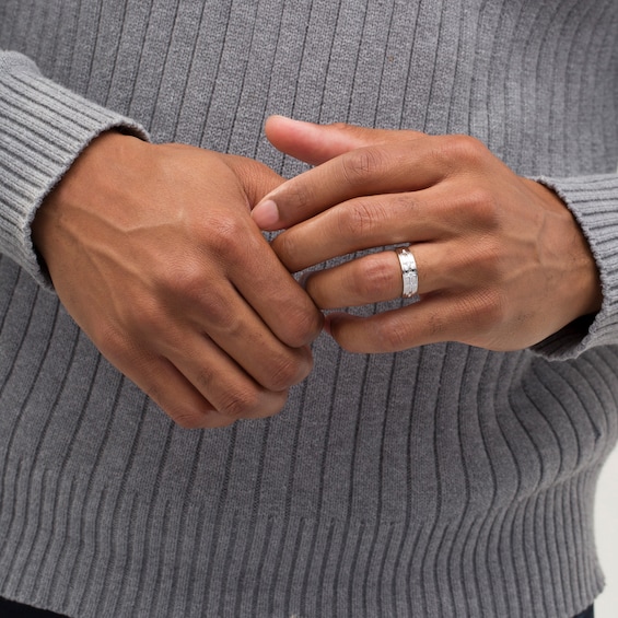 1/5 CT. T.w. Diamond Three Stone Groove Wedding Band in 10K White Gold