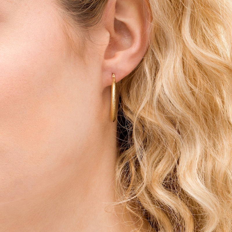 Main Image 2 of 3.05mm Diamond-Cut Graduated Hoop Earrings in Hollow 14K Gold