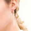 Thumbnail Image 2 of 17.0mm Graduated Swirl Pattern Hoop Earrings in 10K Gold