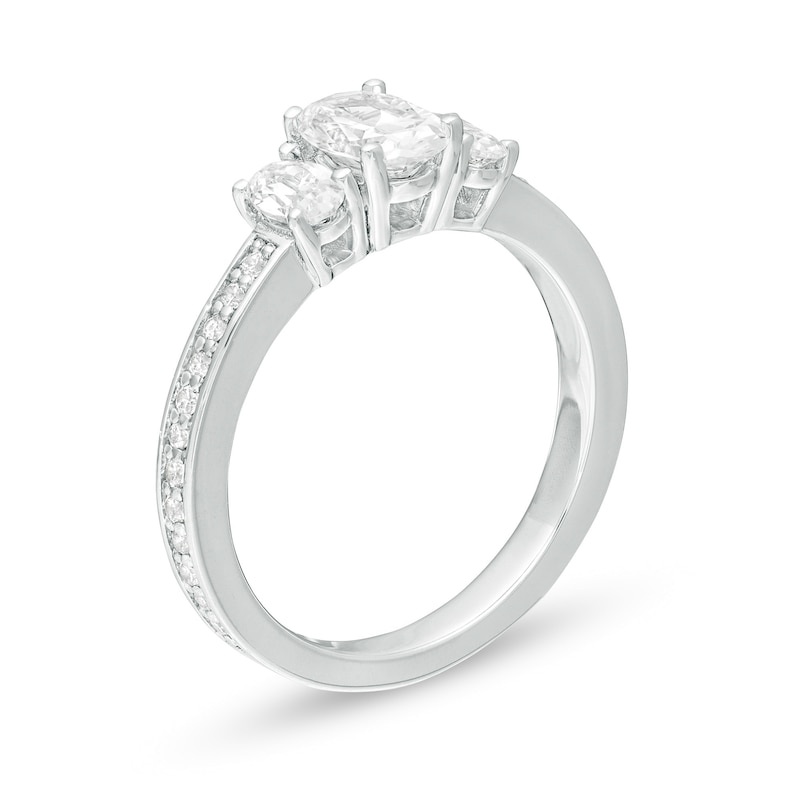 Main Image 3 of 1-1/2 CT. T.W. Certified Oval Lab-Grown Diamond Lined Past Present Future® Engagement Ring in 14K White Gold (G/SI2)