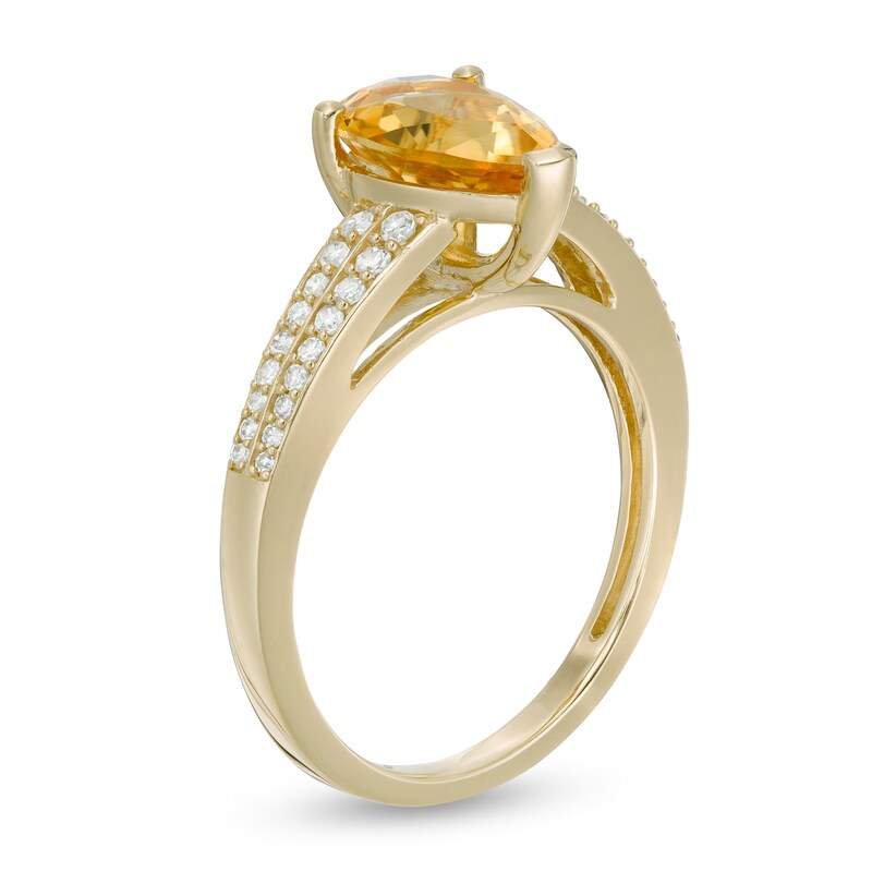 Pear-Shaped Citrine and 1/5 CT. T.W. Diamond Double Row Ring in 10K Gold