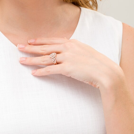 1 CT. T.w. Pear-Shaped Diamond Double Frame Twist Shank Bridal Set in 14K Rose Gold