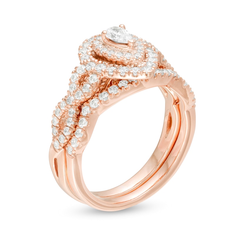 Main Image 3 of 1 CT. T.W. Pear-Shaped Diamond Double Frame Twist Shank Bridal Set in 14K Rose Gold