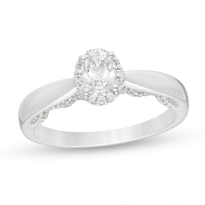 Main Image 1 of Celebration Ideal 3/4 CT. T.W. Oval Certified Diamond Frame Engagement Ring in 14K White Gold (I/I1)
