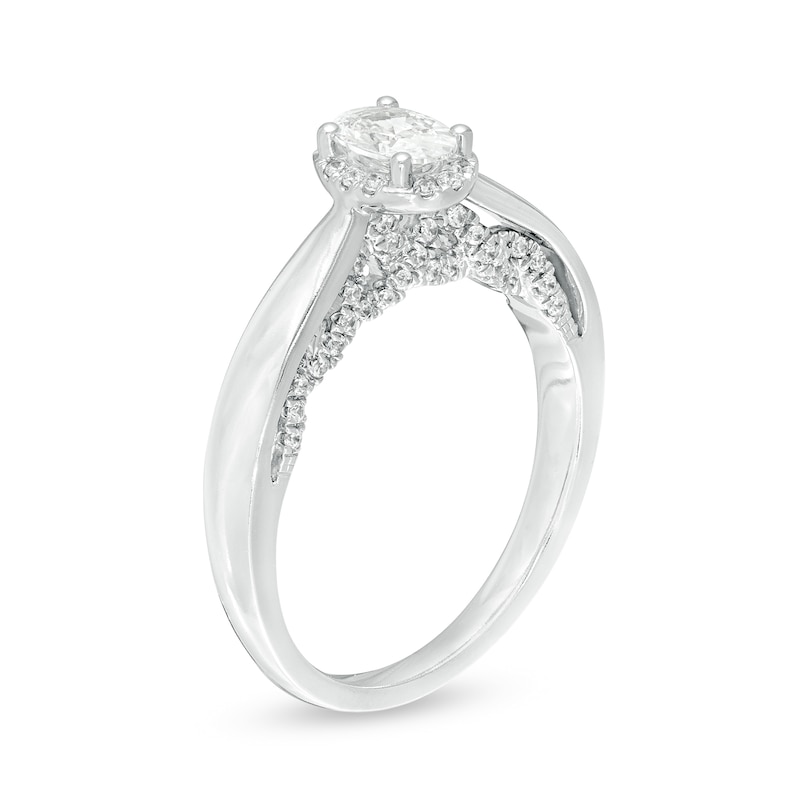 Main Image 3 of Celebration Ideal 3/4 CT. T.W. Oval Certified Diamond Frame Engagement Ring in 14K White Gold (I/I1)