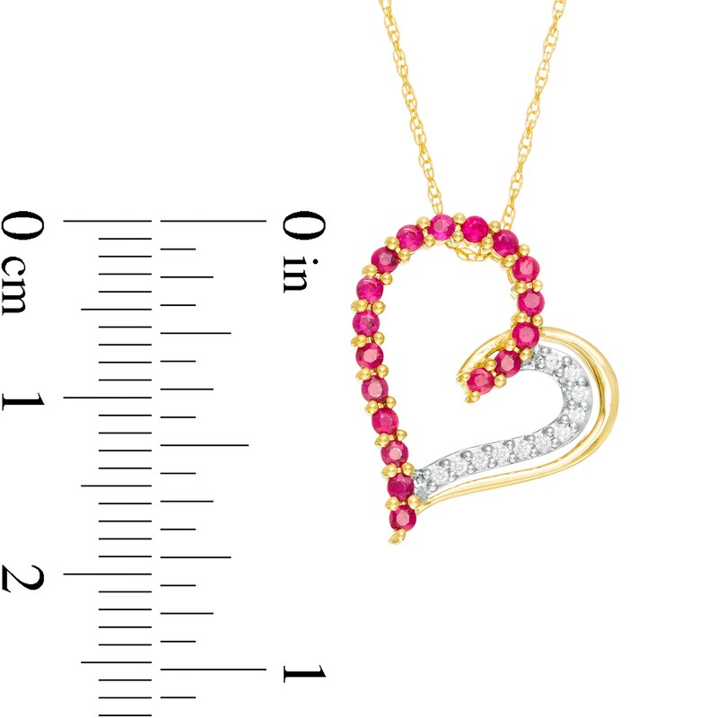 Ruby and 1/20 CT. T.W. Diamond Tilted Heart Pendant in 10K Gold