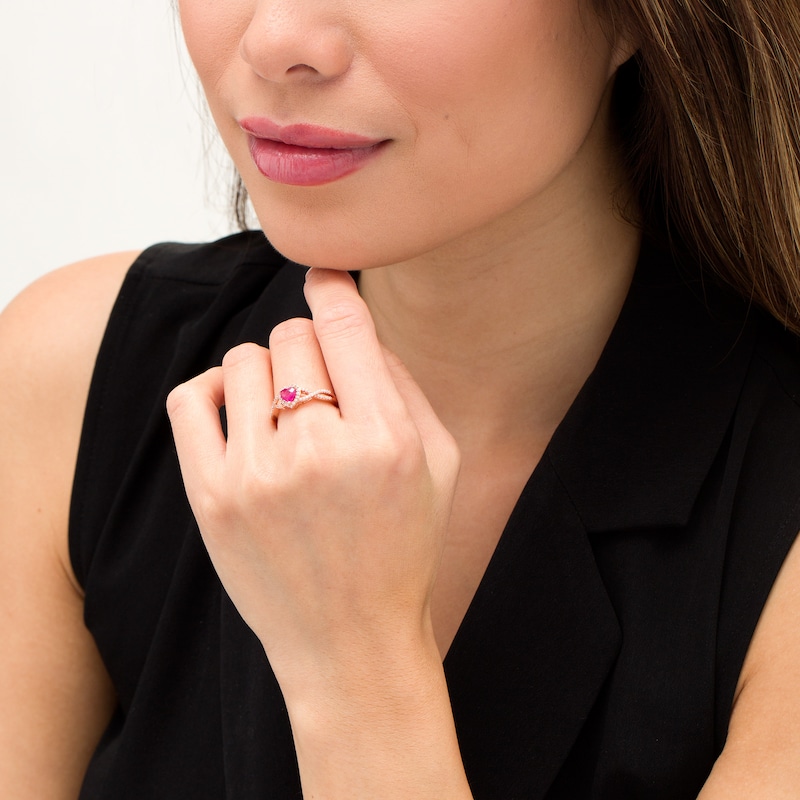Main Image 2 of 5.0mm Heart-Shaped Ruby and 1/6 CT. T.W. Diamond Twist Shank Ring in 10K Rose Gold