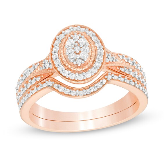 1/5 CT. T.W. Composite Diamond Oval Frame Vintage-Style Bridal Set in Sterling Silver with 14K Rose Gold Plate 1/5 CT. T.W. Composite Diamond Oval Frame Vintage-Style Bridal Set in Sterling Silver with 14K Rose Gold Plate