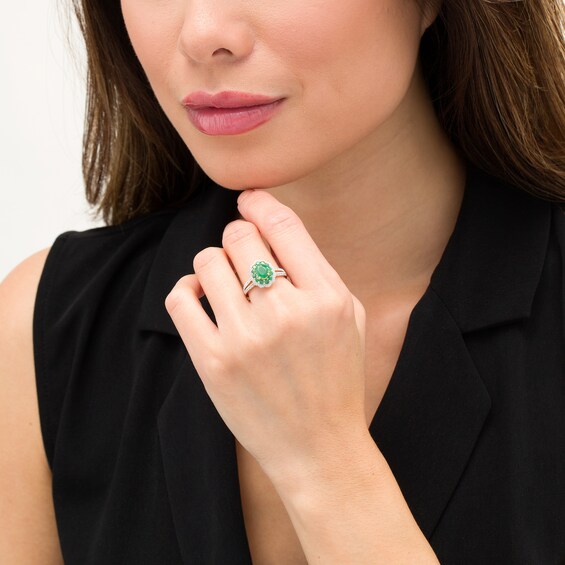 Oval Emerald and 1/4 CT. T.W. Diamond Scallop Frame Split Shank Ring in 10K Gold Oval Emerald and 1/4 CT. T.W. Diamond Scallop Frame Split Shank Ring in 10K Gold