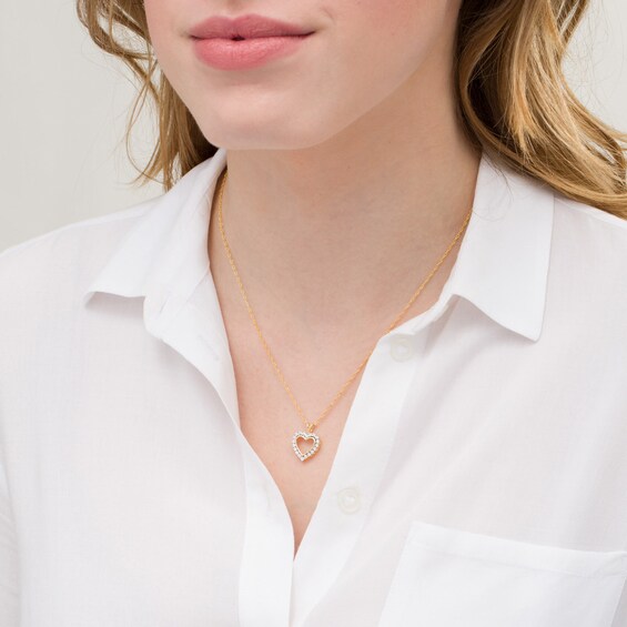 1/4 CT. T.w. Diamond Heart Outline Pendant in 10K Gold