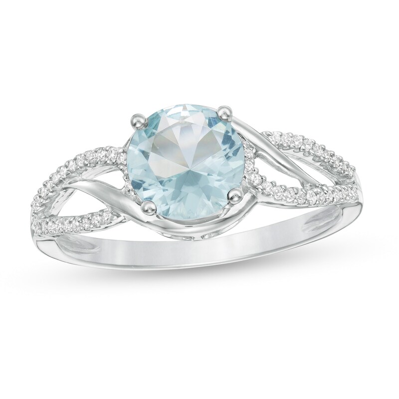 Main Image 1 of 7.0mm Simulated Aquamarine and 0.147 CT. T.W. Diamond Bypass Frame Loop Shank Ring in Sterling Silver