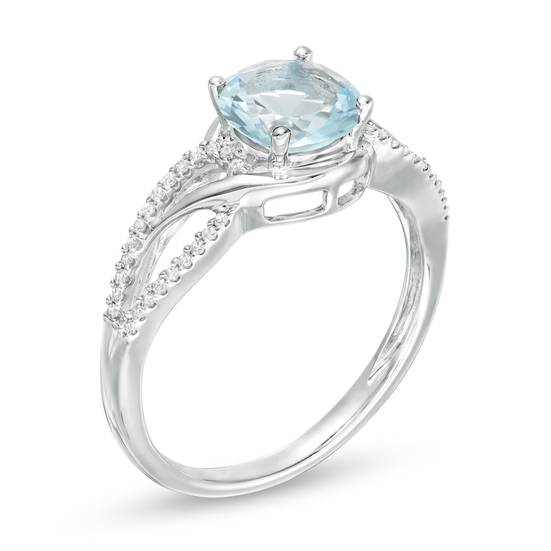 7.0mm Simulated Aquamarine and 0.147 CT. T.W. Diamond Bypass Frame Loop Shank Ring in Sterling Silver