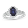 Thumbnail Image 0 of Oval Lab-Created Blue Sapphire and 1/6 CT. T.W. Diamond Flower Frame Double Row Ring in 10K White Gold