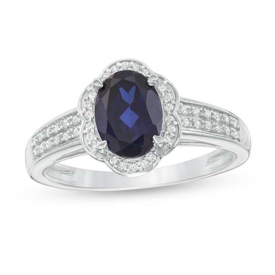Oval Lab-Created Blue Sapphire and 1/6 CT. T.w. Diamond Flower Frame Double Row Ring in 10K White Gold