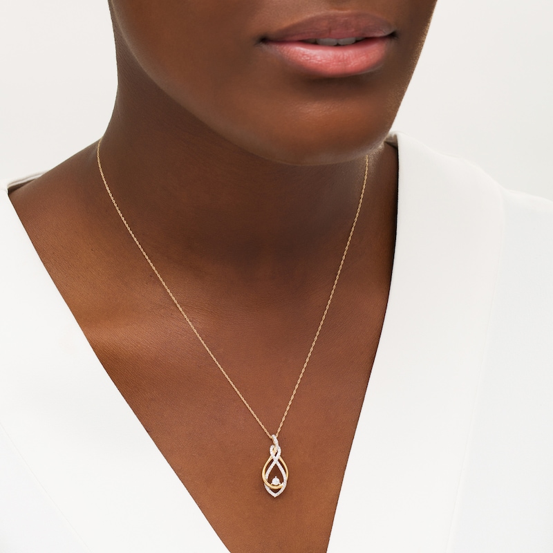 Main Image 2 of 1/4 CT. T.W. Diamond Twist Flame Pendant in 10K Gold