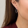 Thumbnail Image 2 of 1/5 CT. T.W. Diamond Heart Hoop Earrings in Sterling Silver