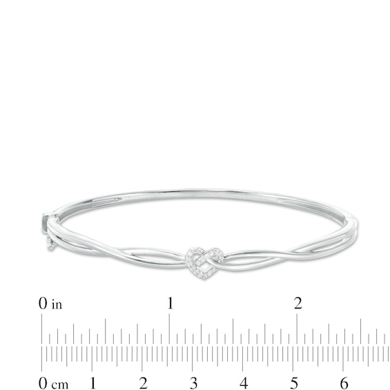 1/10 CT. T.w. Diamond Heart Knot Bangle in Sterling Silver