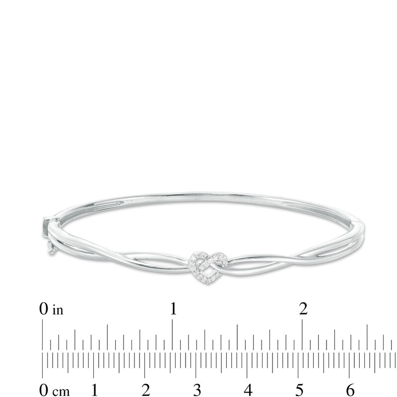 1/10 CT. T.W. Diamond Heart Knot Bangle in Sterling Silver