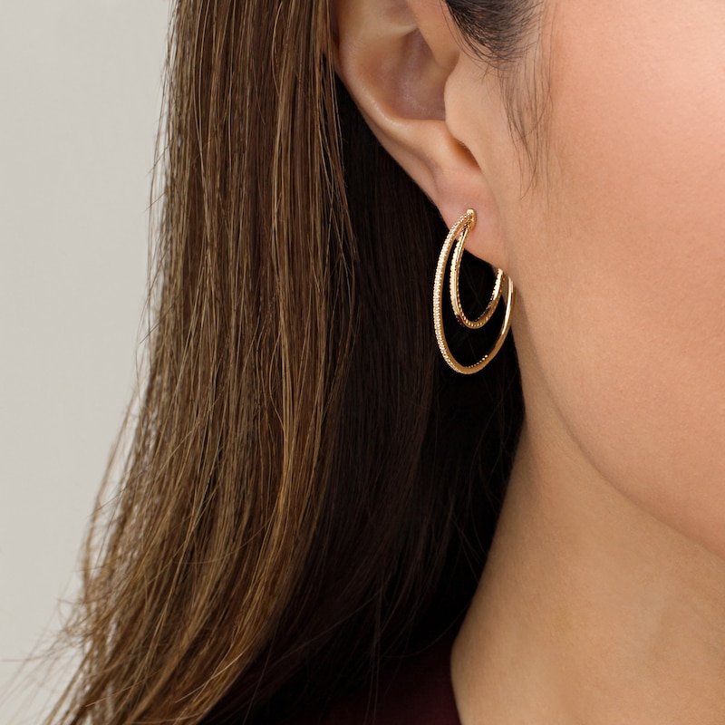 Main Image 2 of 1/2 CT. T.W. Diamond Crescent Moon Hoop Earrings in 10K Gold