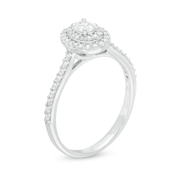 1/2 CT. T.w. Oval Diamond Double Frame Engagement Ring in 10K White Gold